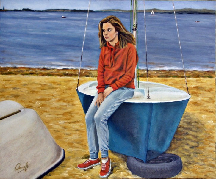 Chica triste en la playa