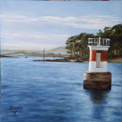 Un faro frente a una isla