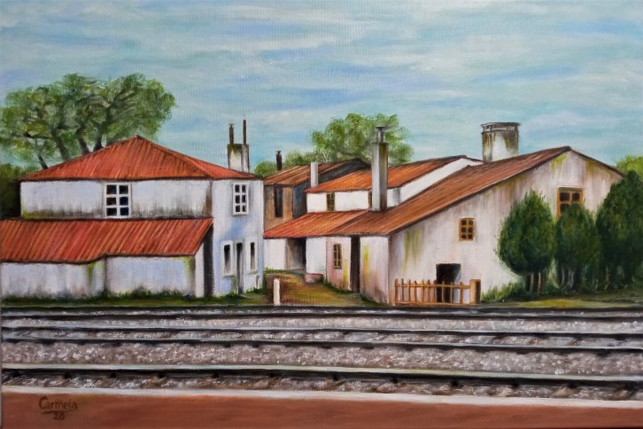 Aldea al lado de vias de tren